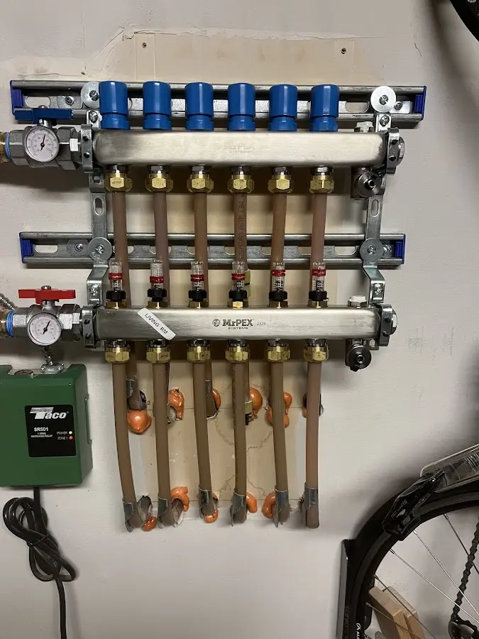 Plumber performing Water Heater Repair at a residential property in Rapid Valley